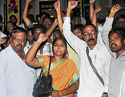 Veerappan's wife Muthulakshmi, along with human right activists, stages a protest in Bangalore on Tuesday. DH Photo