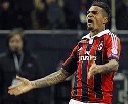 AC Milan's Kevin-Prince Boateng reacts after scoring against Barcelona during their Champions League soccer match at the San Siro stadium in Milan February 20, 2013. Credit: Reuters