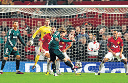 Luka Modric fires in Real Madrids equaliser in their Champions League clash against Manchester United on Tuesday. Reuters