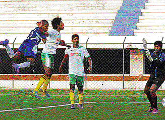 timely strike: Demba Dikhate (left) heads home Mumbai Tigers equaliser on Tuesday. dh photo/ srikanta sharma r