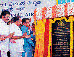 Union Minister for Civil Aviation Ajit Singh unveiling the plaque to mark the inauguration of air cargo complex and CUTE facilities at Mangalore airport on Monday. Union Minister for Petrol and Natural Gas Veerappa Moily, Union Minister of State for Civil Aviation K C Venugopal, Rajya Sabha member Oscar Fernandes and others look on. dh photo