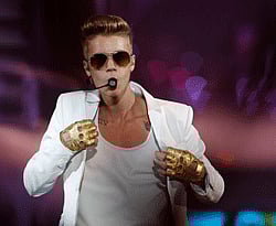 Canadian singer Justin Bieber performs in a concert at the Atlantico pavilion in Lisbon March 11, 2013. REUTERS