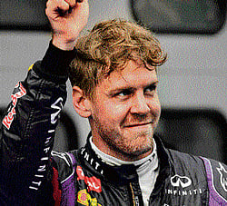 red hot: Red Bulls Sebastian Vettel after taking pole at Malaysian GP on Saturday. AFP
