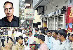 Police officers in front of Rishab Jewellers owned by Shravan Kumar Pokarna (Inset). He was murdered inside the shop in Rajajinagar on Saturday in Bangalore. DH photo