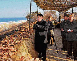 North Korean leader Kim Jong-Un (C) inspects the landing and anti-landing drills of KPA Large Combined Units 324 and 287 and KPA Navy Combined Unit 597 at an undisclosed location on Monday. AFP photo photo