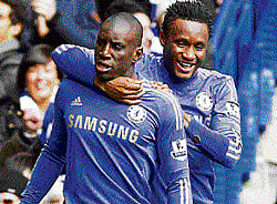 They cant stop me! Chelsea's Demba Ba (left) celebrates with John Obi Mikel after scoring against Manchester United during their FA Cup match on Monday. AP
