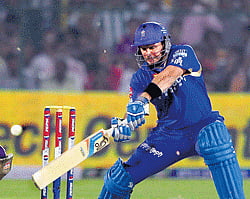 Cut and thrust: Rajasthan Royals Brad Hodge smashes one to the boundary during his unbeaten 46 on Monday. Pti