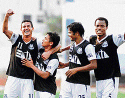 THE SAVIOUR Goal-scorer Jerry Zersingha (centre) celebrates with team-mates. DH photo/ SATISH BADIGER