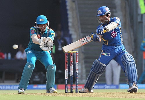 Mumbai Indian player Sachin Tendulkar plays a shot during an IPL-6 match against Pune Warriors in Mumbai on Saturday. PTI Photo