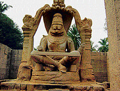 TREASURE HOUSE: Karnataka is home to many monuments such as this fine Ugranarasimha statue in Hampi. (DH File photo)