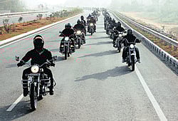 Riders of the Royal Knights Motorcycle Club sticking to formations on the road.