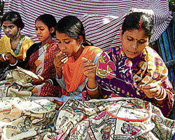 Art on cloth (From left) Women hard at work; a portrait of Rabindranath Tagore; a colourful kantha pattern (PHOTOs BY Dilip Banerjee).