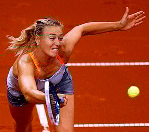 Russia's top seed and holder Maria Sharapova returns the ball to win against China's Li Na in the final of the Stuttgart tennis Grand Prix April 28, 2013. REUTERS