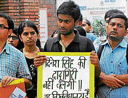 Furious DU students make their point silently.