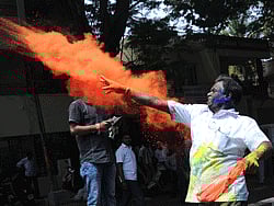Congress Supporters celebrate victory in assembly celection at counting centre SSMRV college in Bangalore on Wednesday./Photo Kishor Kumar Bolar