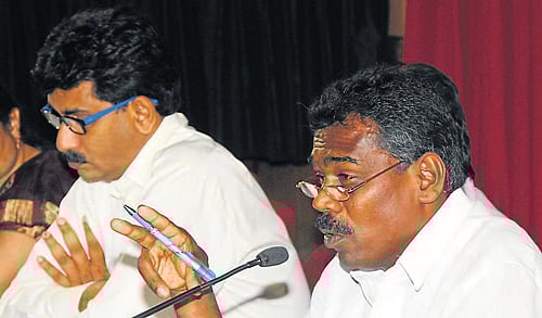 Zilla Panchayat President Koragappa Naik chairing the KDP meeting at ZP Hall in Mangalore on Tuesday. DH photo