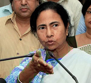 West Bengal Chief Minister Mamata Banerjee addresses the media at Writers Building in Kolkata on Thursday. Banerjee annouced taking over of the two TV channels of Saradha Group by the government. PTI Photo