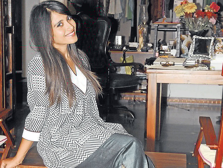 Sampoorna Khanna, III Year, Mount Carmel College, decided to wear a grey and black top with geometric patterns and black trousers. Punchline: "This outfit is classy because it has a vintage vibe. The patterns on the top are lovely." Prices: Top (Rs 1,275) and trousers (Rs 2,500).