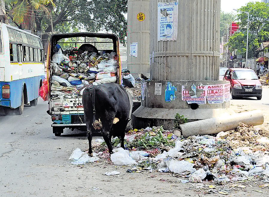 Raising a stink : The space under the Metro near Banashankari is being used to dump garbage. dh photo by S K Dinesh