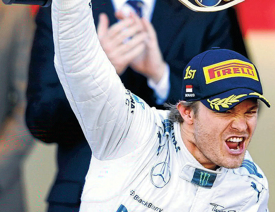 Like father, like son : Mercedes' Nico Rosberg exults after winning the Monaco Grand Prix on Sunday. reuters