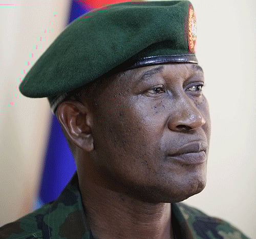 Brig. Gen. Chris Olukolade speaks to journalists from The Associated Press in an interview in Abuja, Nigeria, on Thursday, May 30, 2013. Olukolade, Nigeria's top military spokesman, says officials believe that Islamic extremists now fighting in the country's northeast are receiving outside help. Olukolade says one sign of that help is the increasingly sophisticated weaponry being used by the insurgents, including anti-aircraft guns. Soldiers are now fighting extremists there after an order by President Goodluck Jonathan declaring emergency rule in three northeastern states. (AP Photo