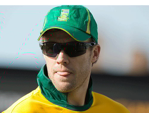 South Africa's captain AB de Villiers leads his players off the field after being defeated in the warm up cricket match for the upcoming ICC Championship Trophy between Pakistan and South Africa at The Oval cricket ground in London, Monday, June 3, 2013. The first game of the tournament takes place in Cardiff on Thursday. (AP Photo