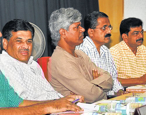 Special honour: (L-R) Writer Nataraj Huliyar, VC of University of Mysore K&#8200;S&#8200;Rangappa, Prof&#8200;Aravinda Malagaththi, B&#8200;Raju and  Halathi Somashekar at the seminar on Devanur Mahadeva's 'Edege bidda akshara' at Rani&#8200;Bahadur auditorium, in Mysore, on&#8200;Saturday. DH Photo