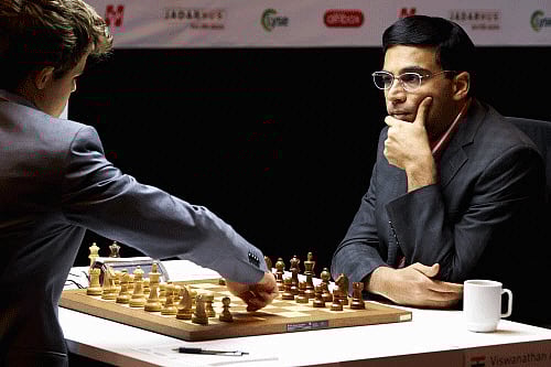 In this file Image, Viswanathan Anand, right, plays against Norway's Magnus Carlsen in the Norway Chess 2013 tournament in Sandnes near Stavanger, Norway,  Ap File Image