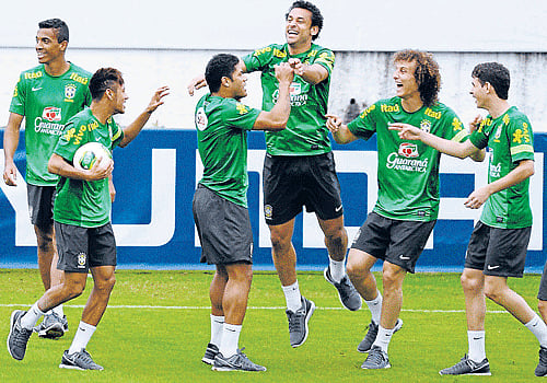 fun and Frolic: Brazilian players have a good time during a practice session ahead of the final against Spain. REUTERS