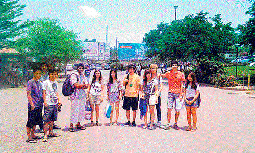 Together: Evelyn (centre) along with her friends.