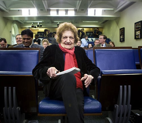File photo of Helen Thomas taking her seat after recovering from a long illness in the Briefing Room at the White House