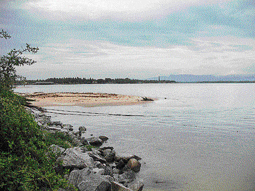 Must visit: The Gangolli estuary is a sight to behold. A dip in the Kotitheertha  (below) before visiting the temple is considered auspicious.  photos by the author