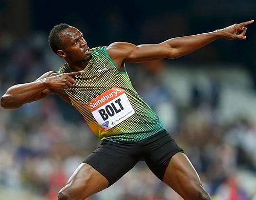 Usain Bolt of Jamaica reacts after winning the men's 100m race during the London Diamond League 'Anniversary Games' athletics meeting at the Olympic Stadium, in east London July 26, 2013. The venue is where the London 2012 Olympic Games were held one year ago. REUTERS