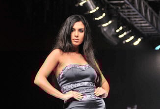 A model poses on the ramp during a Fashion Week event in Bangalore. DH file photo