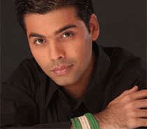 Karan Johar to be part of 'Vettai' remake