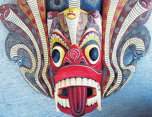All about hues Colourful 'devil' and 'cobra raksha' masks. Photos by author