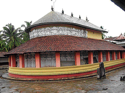 mythical:The idol at Hire Mahalingeshwara temple is believed to be installed by Ravana's father-in-law. (Below) The pond with Karanth's statue. (Photos by author)