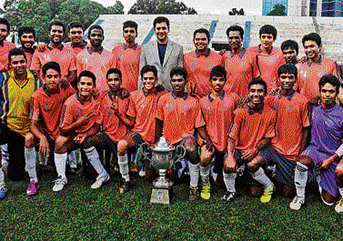 champions:  Income Tax, winners of the 'C' Division league, STANDING (from left): Dennis Christopher (capt), Prem Kumar, Amal Deveghatpal, Joseph Daniel, Anthony, Ramesh, Sudheer, Jai Ganesh (manager), Vikram Selvakumar, K Nedunzeallain, Chethan, Stephenson, Jagannath, Sagainathan (coach). SITTING: Nicholas, Kiran Singh, Deepak Kumar, Dinesh Kumar, Nithyanandan, Ramesh, Manoj Kumar, Shiva Kumar, Navin Kumar, Manuel Raju, Kiran. dh photo