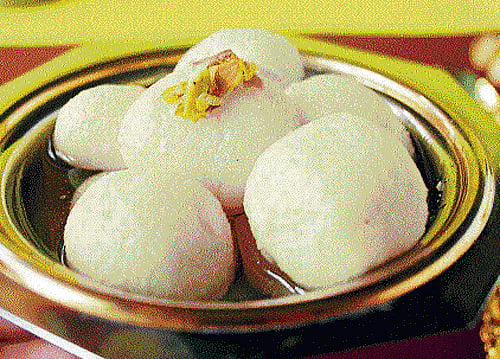 Mouthwatering: Rosogollas swimming in sugar syrup.