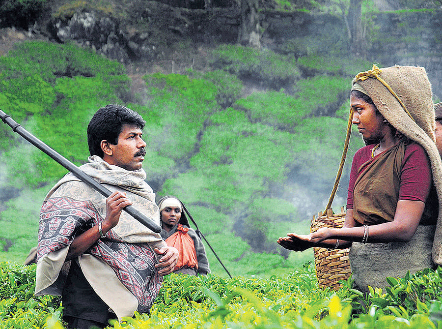 Unique Bala Palanichamy (left) with one of the actors in the film 'Paradesi.'