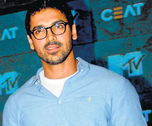 happy: John Abraham