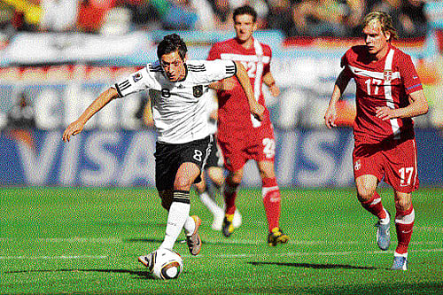 big move: North Londoners Arsenal paid Real Madrid a club-record fee for the German midfielder Mesut Ozil on Monday.