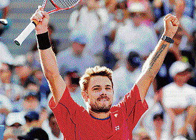 red hot: Stanislas Wawrinka celebrates after his win over Andy Murray. AFP