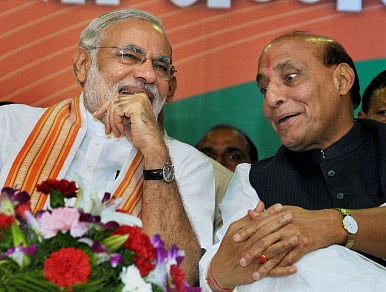 BJP President Rajnath Singh and Gujarat Chief Minister Narendra Modi. PTI photo