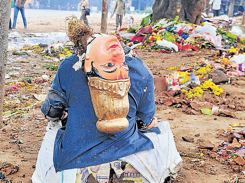The leftover: An idol of Gowri in a broken state after immersion in the Ulsoor lake on Thursday. DH Photo
