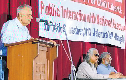 PUCL National President Prof Prabhakar Sinha speaks at a public interaction programme                organised by PUCL Karnataka at Balmatta in Mangalore on Saturday.