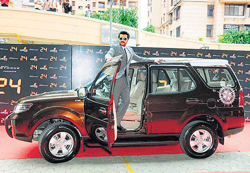 Actor Anil Kapoor poses with the Tata Safari Storme Explorer Edition.