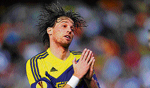 thank you very much! Swansea City's Michu celebrates after scoring against Valencia on Thursday. AP