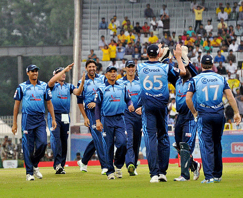 Players of Titans celebrate the fall of a Hyderabad Sunrisers wicket during their match at Champions League Twenty-20 in Ranchi on Saturday. PTI Photo