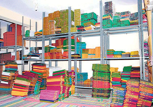 Loss: The uncleared stock of sarees at a shop at Banahatti in Bagalkot district. dh photo
